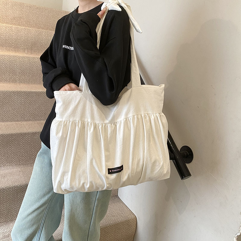 Witte boodschappentassen met g - Interior Design Class recensie en prijs